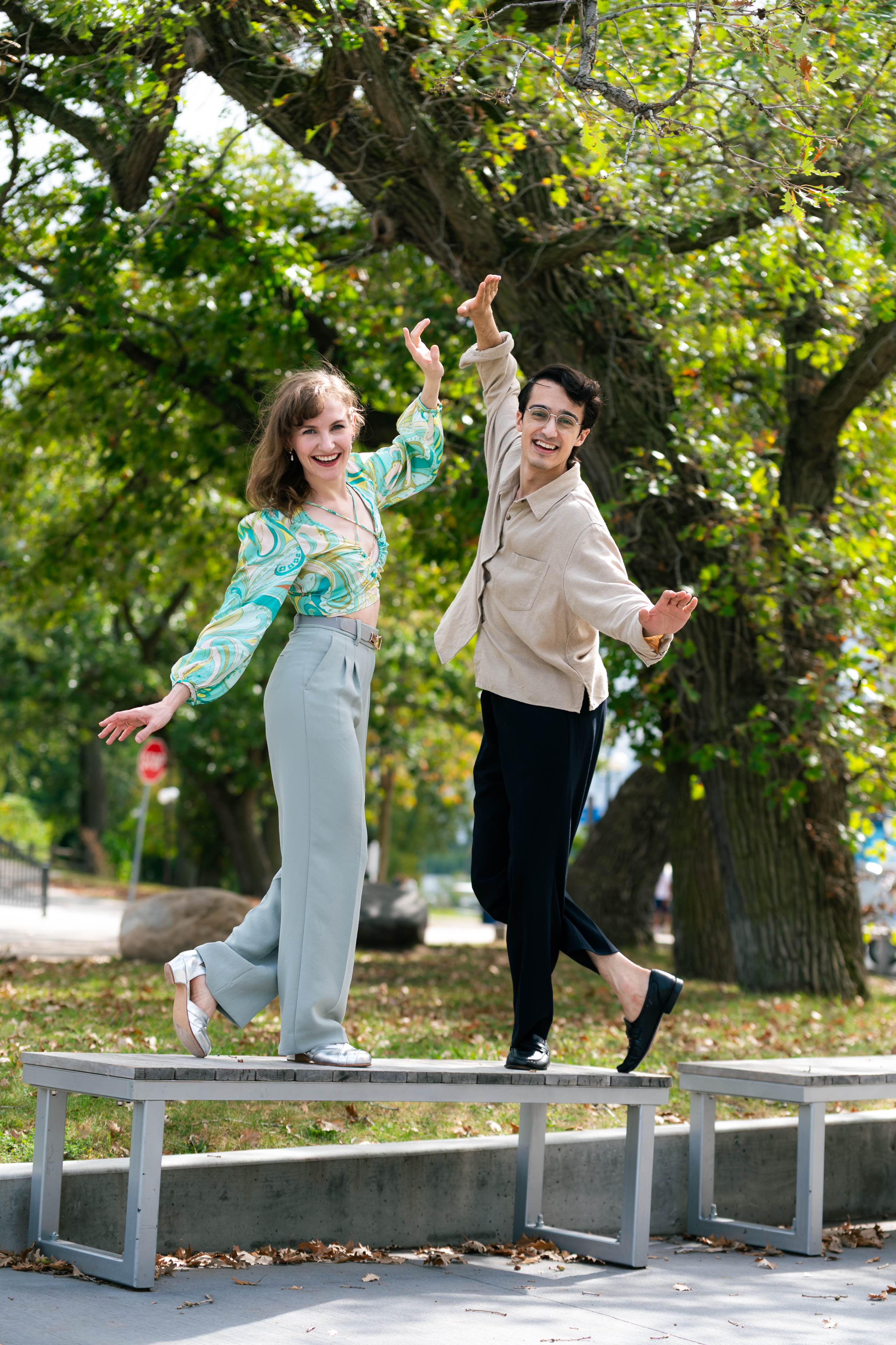 Grace and Hussain at a waterside location.
